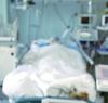 Patient in hospital bed - blurred photo