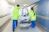 Blurry patient on gurney in hospital