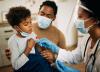 Boy getting PCR nasal swab