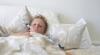 Boy sick in bed