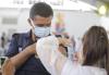 Brazilian police officer getting COVID vaccine