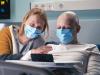 Cancer patient and visitor wearing masks