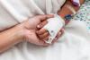 Child's hand in hospital with IV