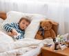 Sick boy in bed