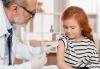 Girl receiving vaccine