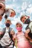 Circle of children wearing masks