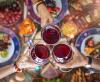 Clinking wine glasses at Thanksgiving