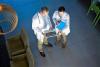 Doctor consult with laptop
