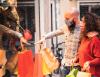 Couple wearing masks shopping