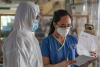 Health workers in COVID-19 protective equipment