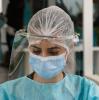 Health worker with face shield in Brazil