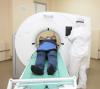 Man wearing mask getting an MRI