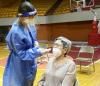 COVID nasal swab testing in gymnasium
