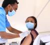 Woman getting COVID-19 vaccine