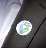 COVID vaccine sticker on lapel