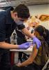 Young woman getting COVID vaccine