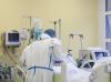 Healthcare worker at patient's bedside
