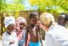 Doctor with African children