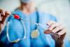 Doctor holding swab