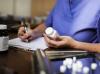 Doctor writing prescription