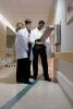 Doctors consulting in hallway