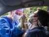 Drive-through nasal swab testing