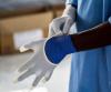 Ebola gloving up