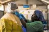 Donning Ebola personal protective equipment