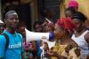 Worker uses megaphone to educate in Guinea