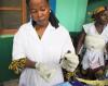 Healthcare worker preparing vaccine