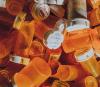 Pile of empty pill bottles