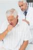 Examining coughing senior