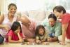 Extended family playing board game