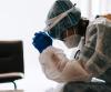 Fatigued healthcare worker wearing protective equipment