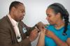 Woman receiving vaccination