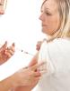 Woman receiving flu vaccine