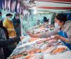 Fish market in France, mask wearing