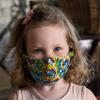 Girl wearing colorful mask