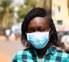 Girl wearing mask in Mali