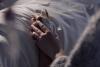 Hand holding in hospital