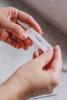 Hands holding rapid COVID-19 test