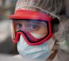 Healthcare worker wearing mask goggles