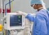 Healthcare worker with gloves and mask