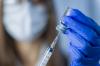 Drawing vaccine into a syringe