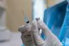 health worker syringe