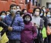 Hong Kong crowd wearing masks