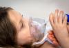 Hospitalized girl getting respiratory support