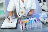 Lab technician conducting urinalysis