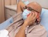 Male cancer patient talking on phone