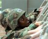 Marine recruits on obstacle course